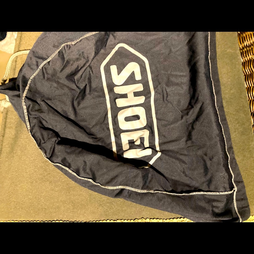Shoei helmet bags (4) and Arai helmet bag (1)
